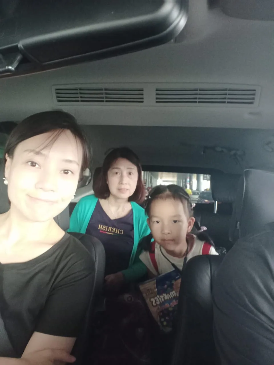 Three generations of family in comfortable transfer