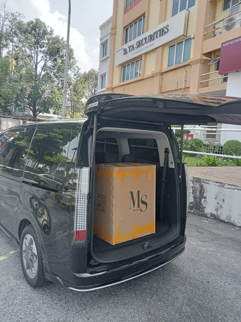 Hyundai Staria boot with large corporate delivery package