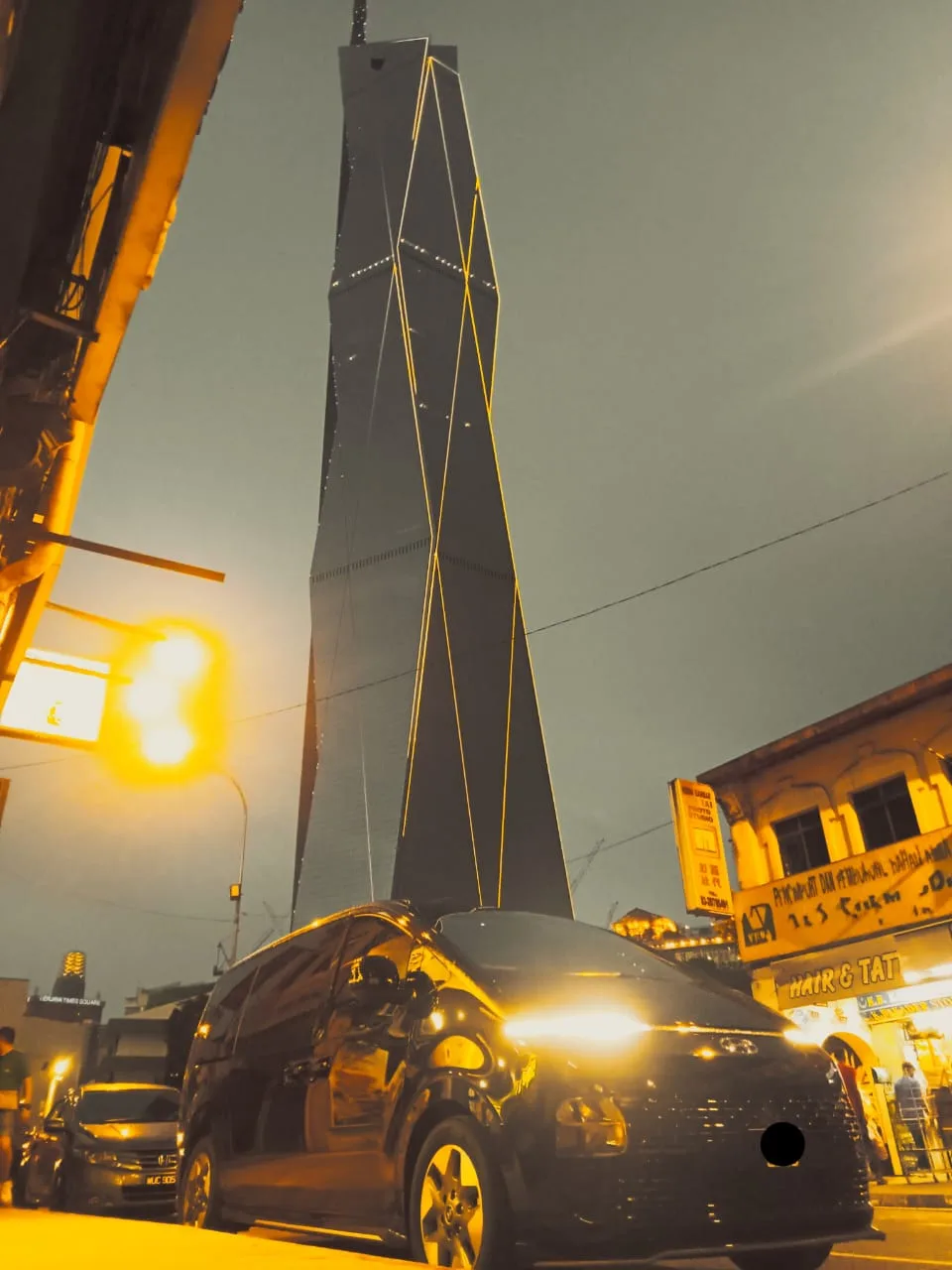 Staria with Merdeka 118 tower at night